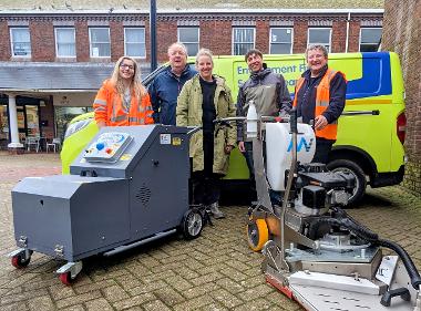 Cllr Maples (centre), Chris Ketley (second from left) and Guy McQueen, the council’s regeneration project manager (second from right), with street cleansing staff.