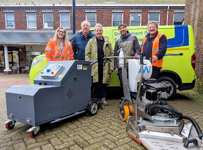 Cllr Maples (centre), Chris Ketley (second from left) and Guy McQueen, the council’s regeneration project manager (second from right), with street cleansing staff.